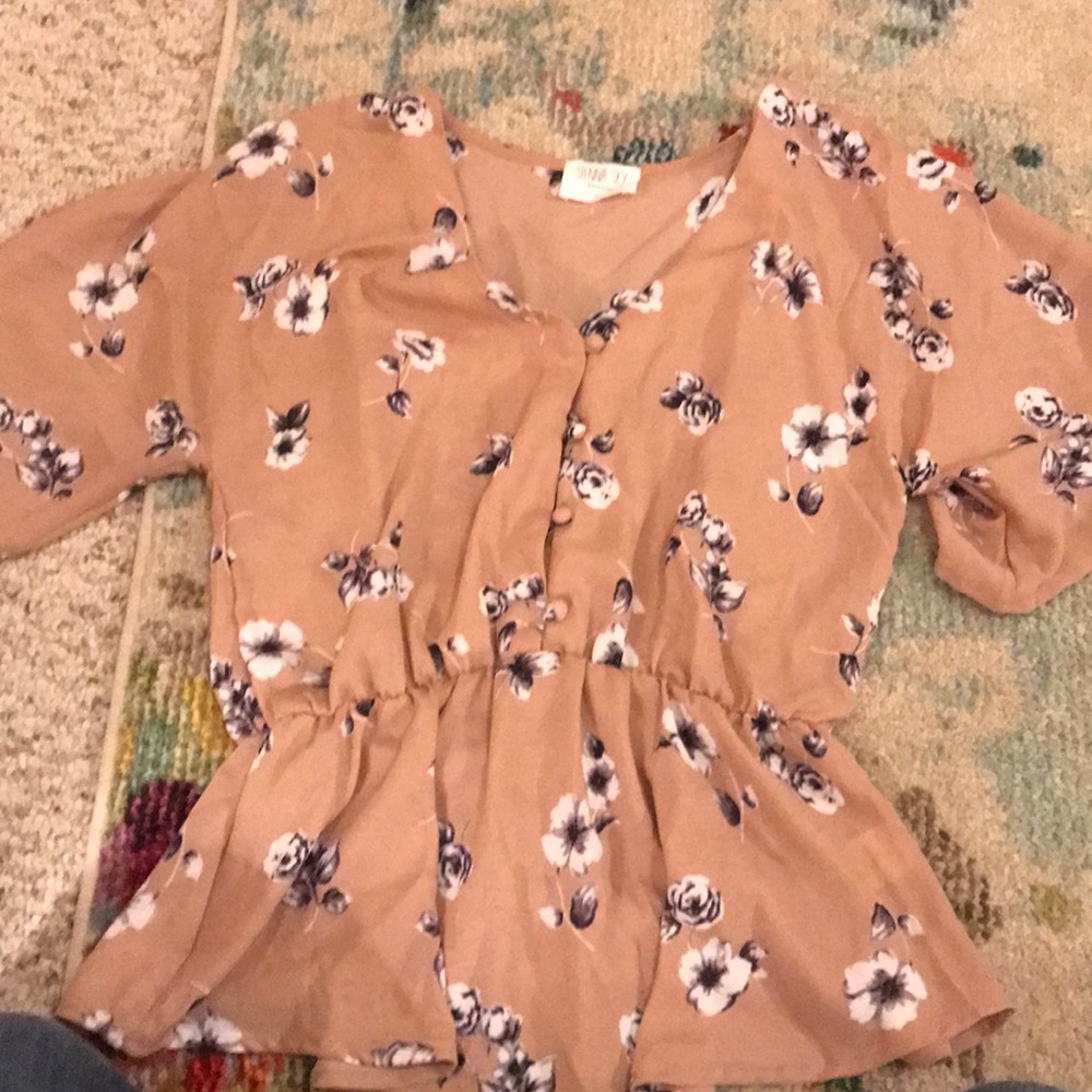 Blush/nude colored peplum style blouse